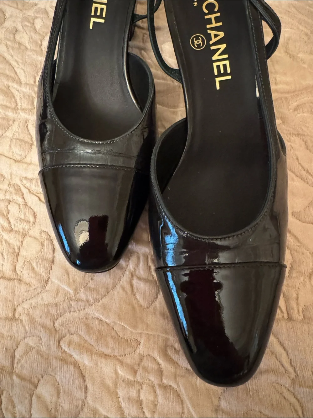 CHANEL Black Patent Leather Slingback Pumps with Cap Toe